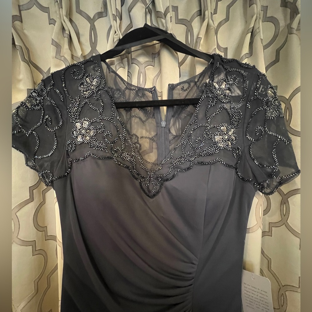 Xscape special occasion dress. Grey w/beads. Size 8. NEW w/tags. Beautiful